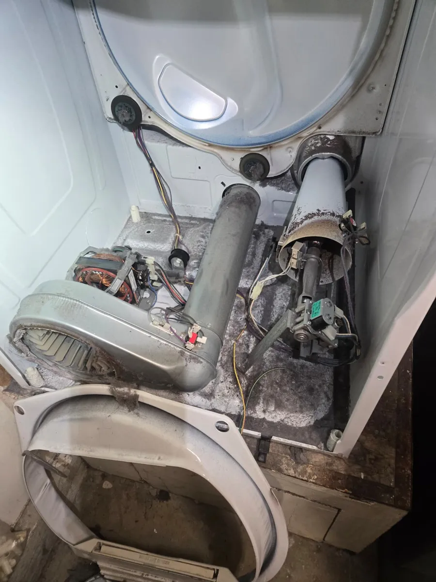 Dryer opened by Epic Star showing a lint-clogged motor and blower before cleaning in Sherman Oaks, CA
