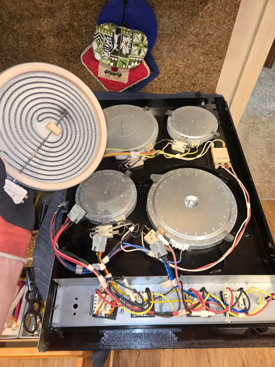 Electric cooktop removed for heating element repair by Epic Star in Century City, CA