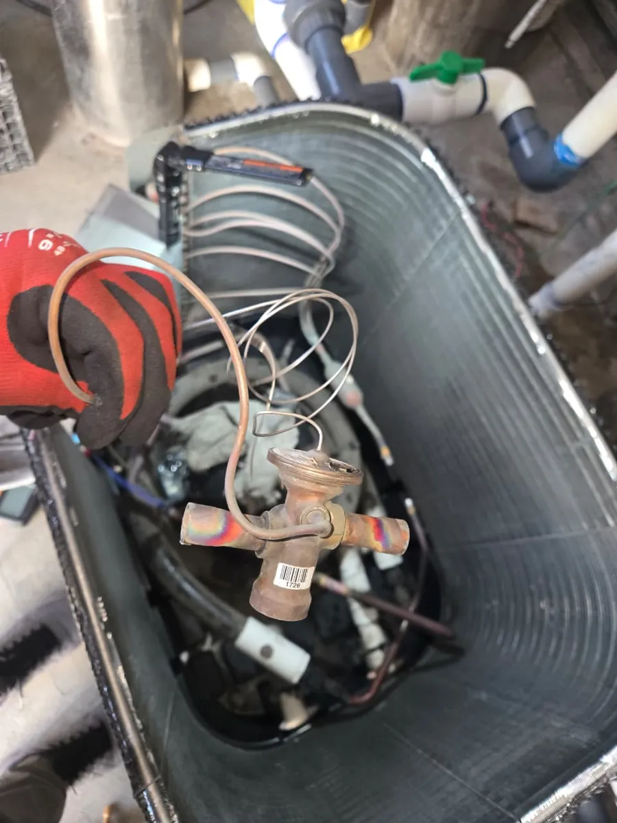 Refrigerant expansion valve replaced inside a condenser unit by Epic Star in North Hollywood, CA