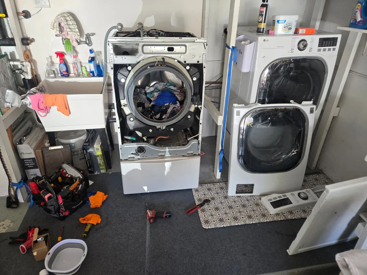 LG front-load washer and dryer set, washer opened for repair by Epic Star in Manhattan Beach, CA