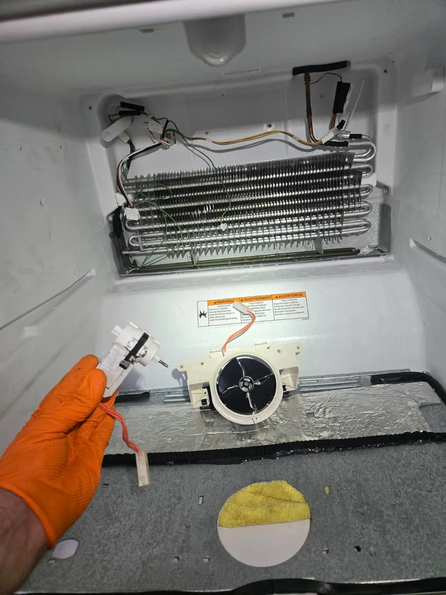 Refrigerator evaporator coils and fan motor sensor inspected by Epic Star in Mar Vista, CA