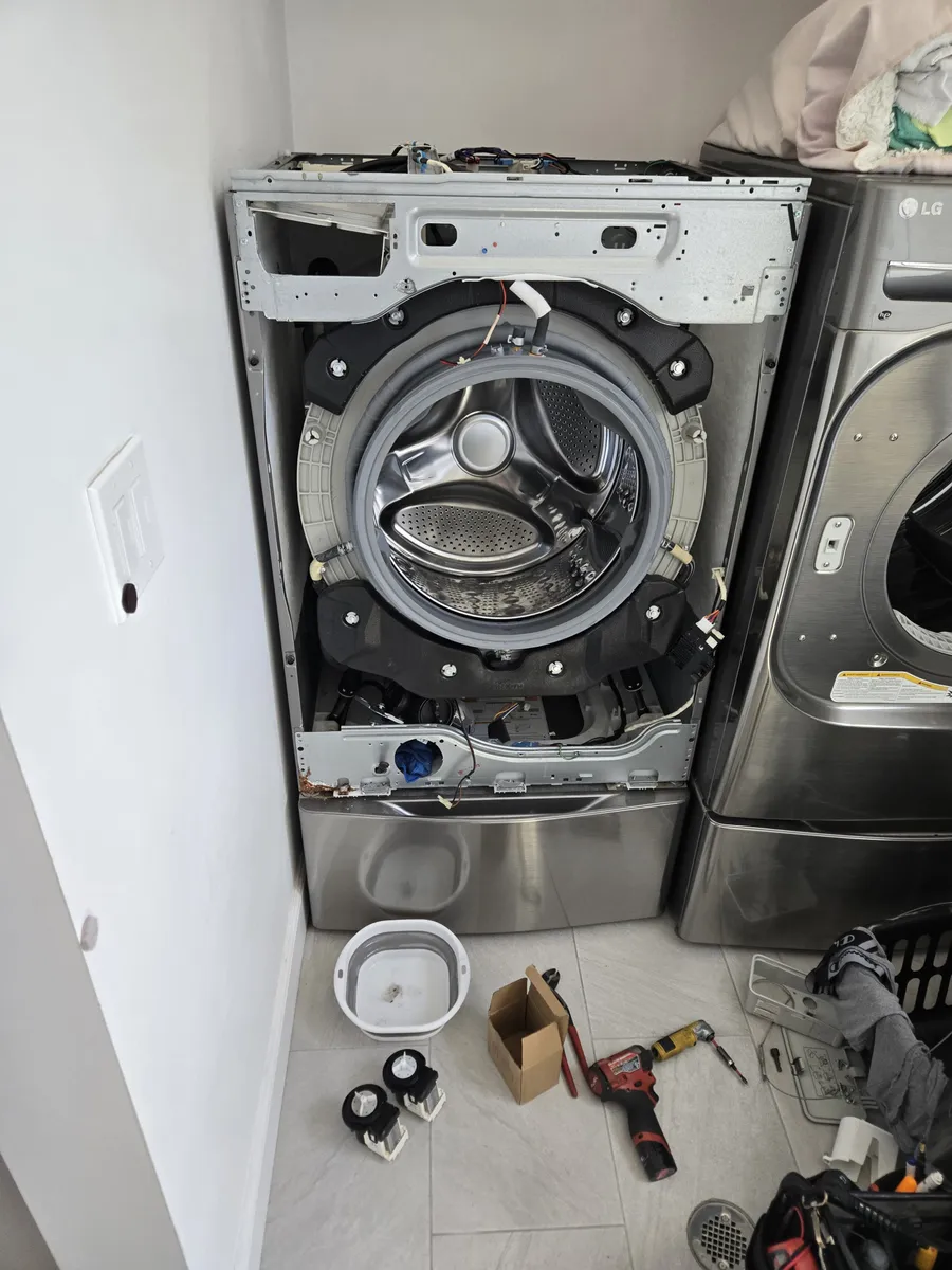 Washer drain pump replacement in progress by Epic Star in Playa del Rey, CA